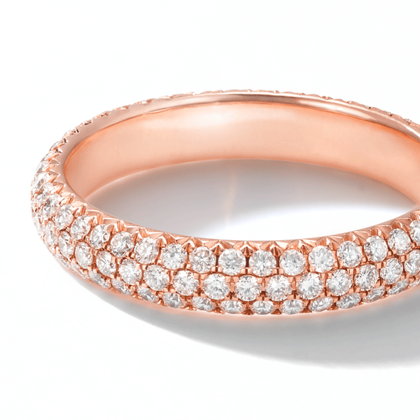 64Facets diamond band with brilliant cut diamonds in a pave setting in 18K gold