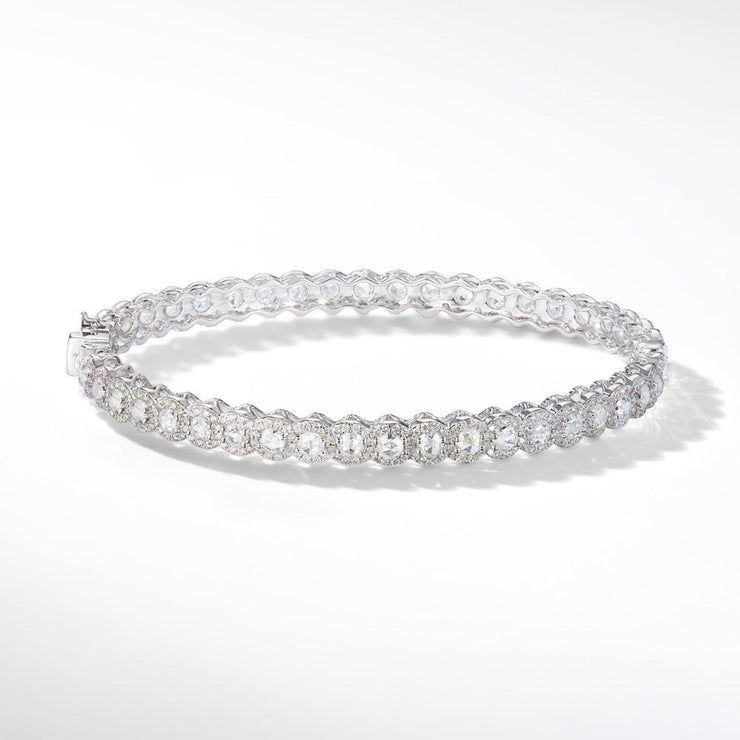 Scallop Diamond Bangle. Round rose-cut diamonds accented by round brilliant cut diamonds. 18k Rose and White Gold.